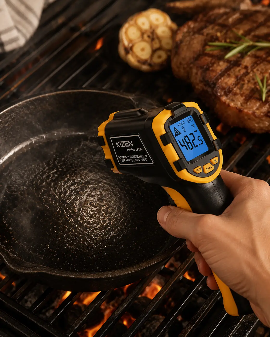 KIZEN infrared thermometer gun aimed at a pan